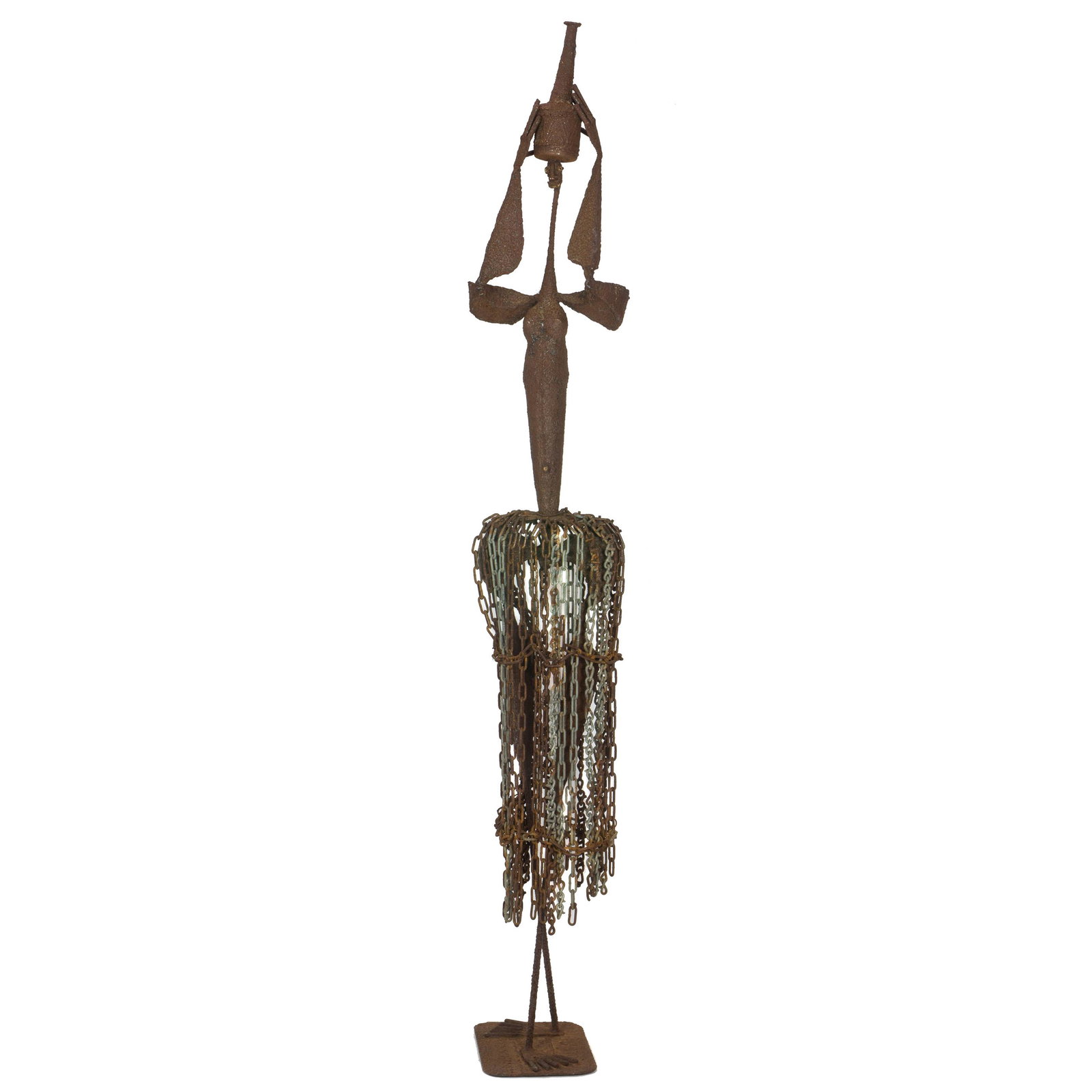 A South African steel sculpture: A South African steel sculpture, by Jon Eu De Komenie, the abstracted form wearing a chain link skirt,