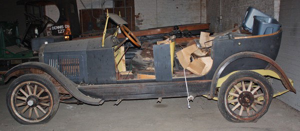 1926 Willys Knight: 1926 Willys Knight, black. Wooden wheels, doors and running boards removed. Various parts located in interior, vehicle is said to be complete. Upholstery missing, body is straight.