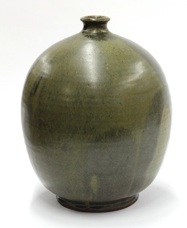 Art Pottery vessel: Art pottery ovoid vase, of organic form and having a circular mouth surmounting the bulbous form and terminating on a circular foot, marked Judd 62, Provenance: Collection of Hazel V. Bray, Associate 