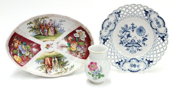 Meissen group: (lot of 3) Meissen porcelain table articles including a blue and white plate, serving dish and bud vase having a bulbous form with a floral medallion, marked on base