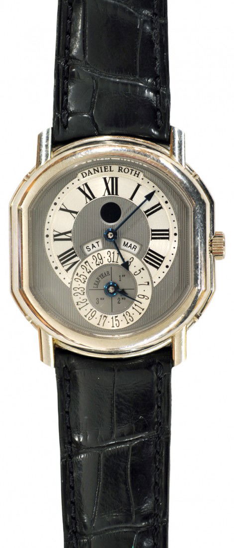 Gentleman's Daniel Roth No.12 calendar wristwatch: Gentleman's DANIEL ROTH No. 12 calendar wristwatch; of 18k white gold, features day, date, month and leap year. 36 x 38 mm case, exhibition back, 18k yellow gold router and a black leather strap with