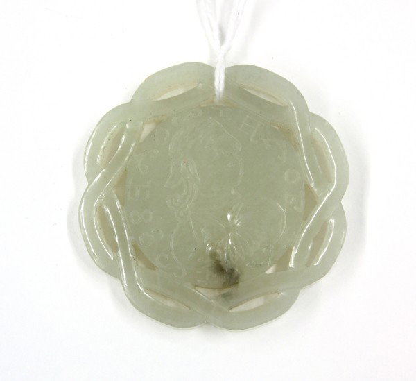 Chinese Jade Medallion Carved as a European Coin: Chinese jade medallion in the form of a European coin, either side of the coin incised with a portrait accompanied by an inscription in Roman letters, all framed with an openwork braided border, of a 