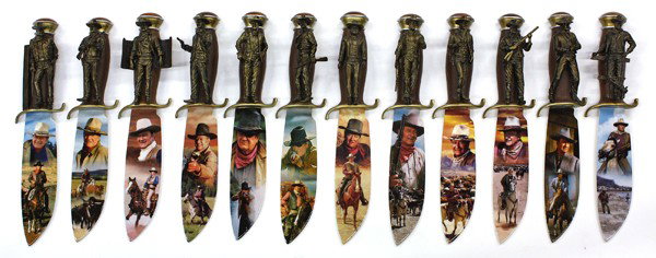 John Wayne decorative knives: (lot of 12) John Wayne decorative knives, issued by the Bradford Exchange and each depicting The Duke in a different pose, length 10.5''l