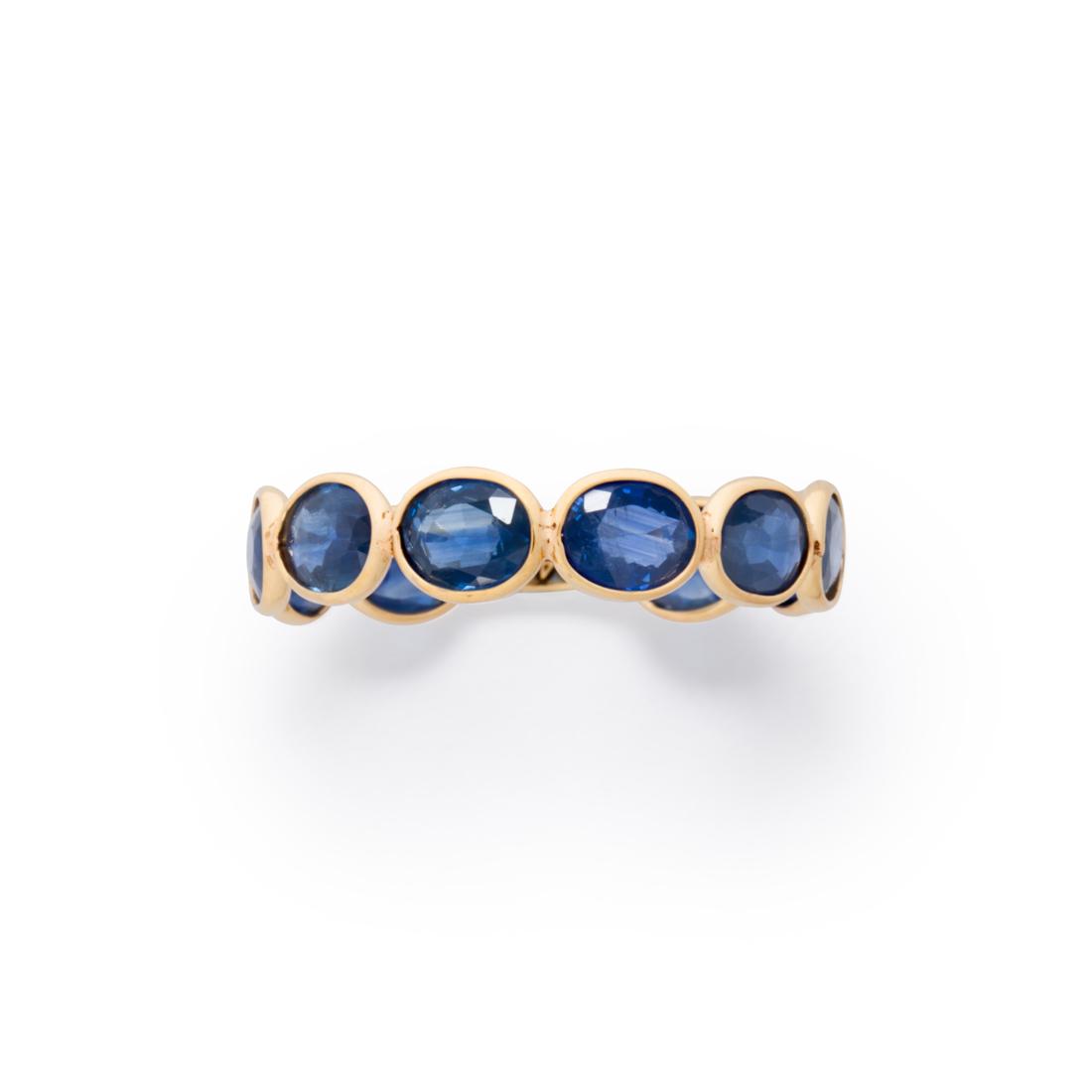 A sapphire and eighteen karat gold ring (1 of 2)