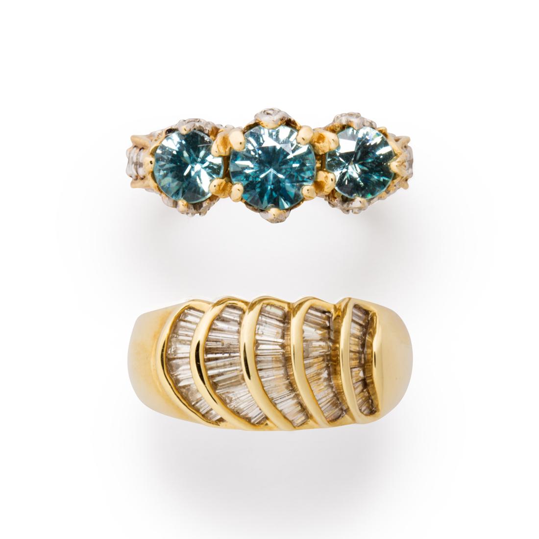 A group of CZ, blue zircon and fourteen karat gold ring: A group of CZ, blue zircon and fourteen karat gold ring including a ring set with channels of CZs; a ring centered by three circular-cut blue zircons, measuring approximately 5.00 or 6.00 mm in diamet