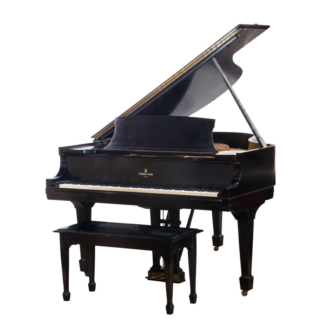 A Steinway Model M baby grand piano executed in 1935: A Steinway Model M baby grand piano executed in 1935, serial number 280225, with an ebonized finish, and rising on Marlborough legs terminating on casters, with bench, overall 5'7"