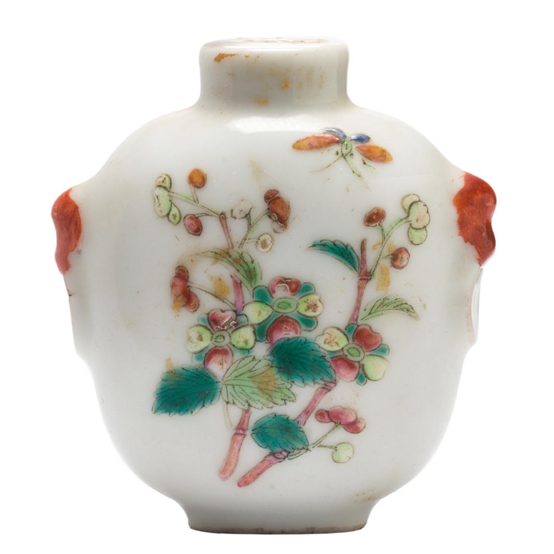 Chinese famille rose snuff bottle: Chinese famille rose snuff bottle, of flattened tapering form and decorated with butterflies and flowers, the recessed base featuring a Qianlong four-character mark in underglaze blue, 2.375"h.