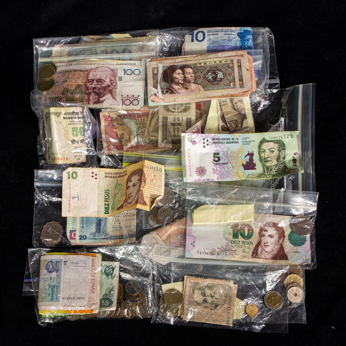 A bag of foreign coins and currency (1 of 1)