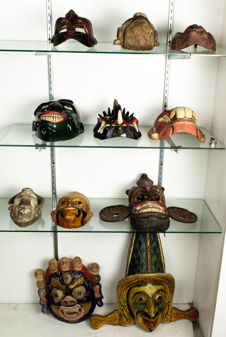 (Lot of 11) Mostly Southeast Asian polychrome carved wood masks (1 of 1)