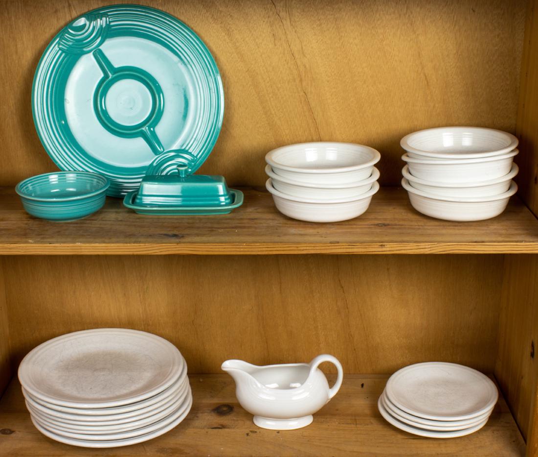 (Lot of 22) Two shelves of Fiesta ware in turquoise and white glaze (1 of 1)