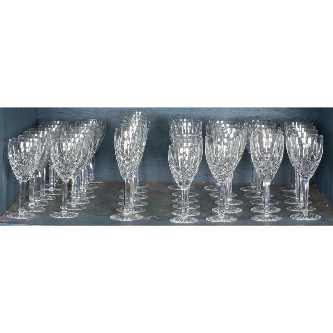 (Lot of 82) Waterford cut glass suite of stemware in the Araglin pattern: (Lot of 82) Waterford cut glass suite of stemware in the Araglin pattern, comprising (17) water goblets, 8"h: (23) wine, 7.25"h; (27) champagne flutes and (15) baloon wine glasses, 7.5"h.