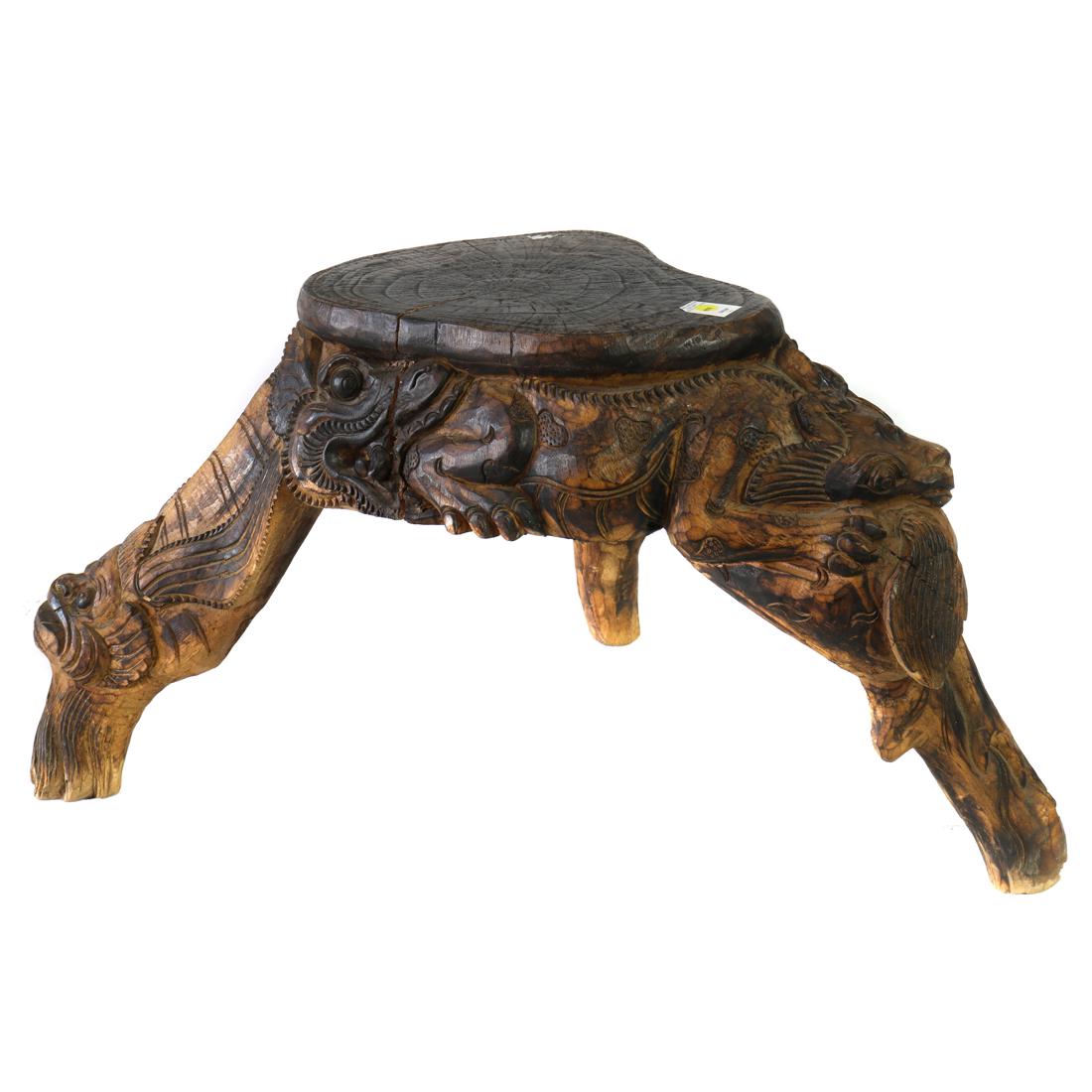 Southeast Asian carved wood tripod stand: Southeast Asian carved wood tripod stand, approximately 19.5"h. x 34"w.