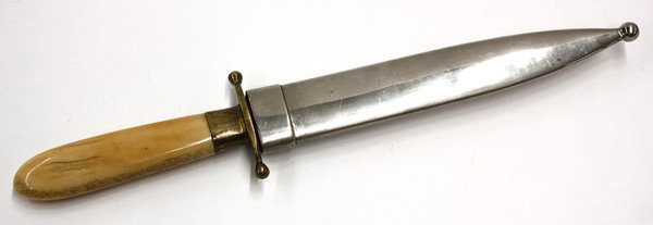 Early San Francisco style dagger: American Dagger knife, circa 1870, with a 6.75'' spear point, one piece walurs ivory grip, with a brass ferule and pommel plate, German silver scabbard, overall: 11''