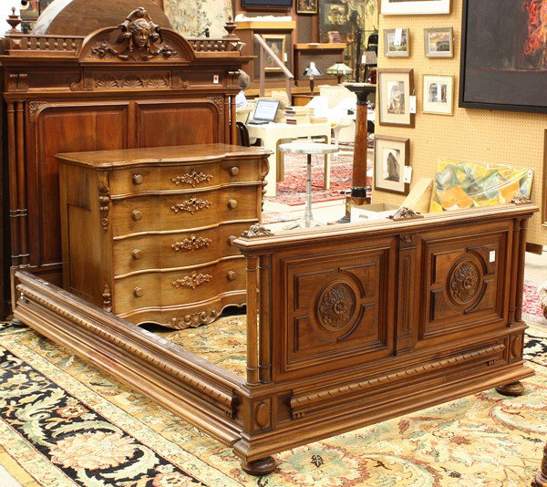 French Renaissance style bed: French Renaissance style bed circa 1860, having a finial capped and galleried crest rail centering the figural relief carved central medallion depicting a maiden executed in high relief, the panelled 