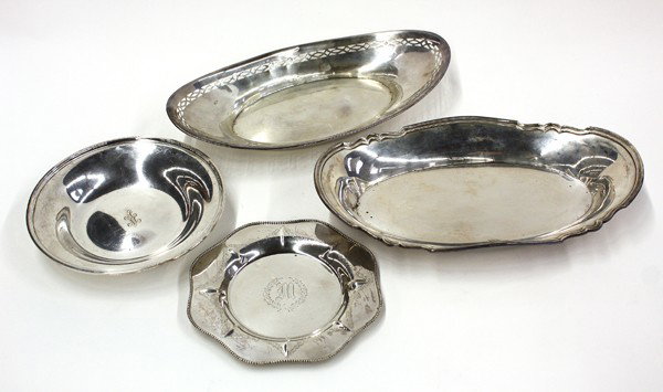 Sterling table articles: Four American sterling silver table articles consisting of two bread trays, bread plate, and a bowl, by Shreve & Company, Whiting Manufacturing, and S. Kirk & Son, 21.67 troy oz. Provenance: Property 