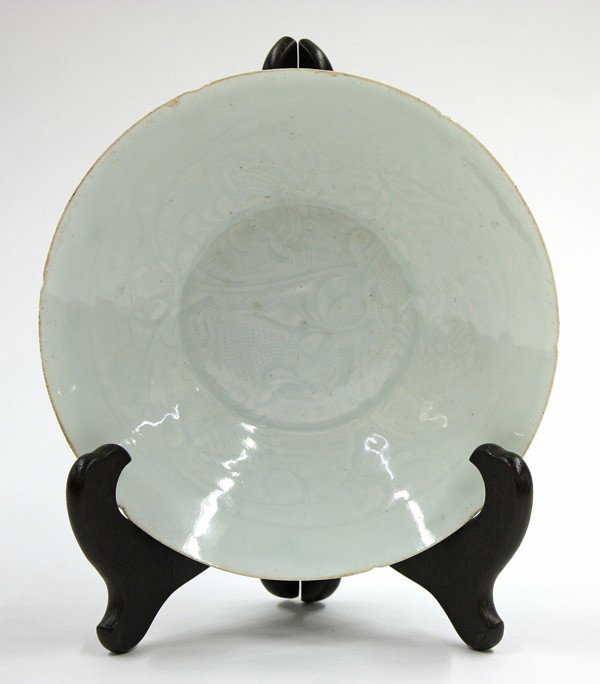 Chinese 'Qingbai' Bowl, Floral Pattern,S.Song: Chinese qingbai glazed shallow bowl, Song dynasty, the well and the interior sides carved and incised with a continuos decoration of scrolling foliates all below the rim cut with six notches, the char
