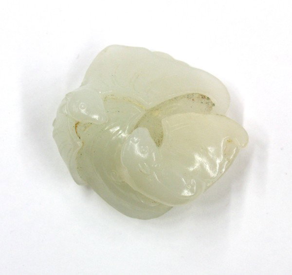 Chinese Jade Handling Piece, Bat: Chinese jade handling piece, fashioned with a pair of bats with pointed heads and incised features with wings wide spread draping over to the reverse, which similiarly depicts a large bat in high reli