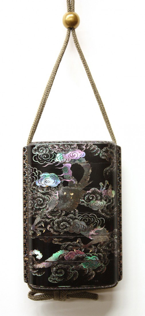Japanese Somada School Inlaid Inro, Edo: Japanese Somada school four-case inro, Edo period, 19th century, the flattened body expertly inlaid in aogai with a dragon emerging from billowing clouds reversed by a dramatic waterfall with cresting