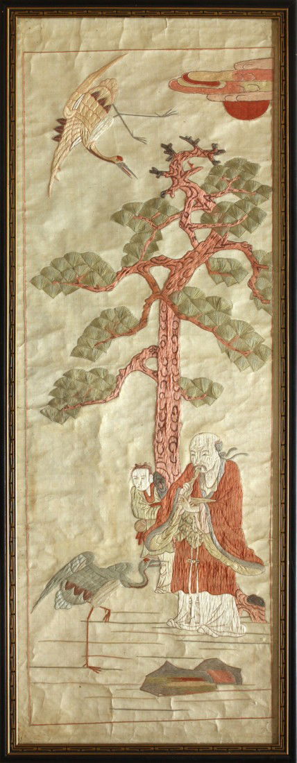 Korean Embroidery Panels, Tiger/Immortal: (Lot of 2) Framed Korean embroidered textile panels, one with a pair of dynamic tigers beneath a pine tree with two birds all worked in color threads in satin stitches; the other embroidered with an i