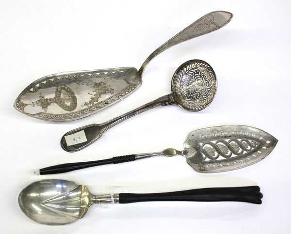 Silver serving pieces: Four silver serving pieces including an ebony handle and sterling silver spoon by Gorham, late 19th century, and a French sugar sifter