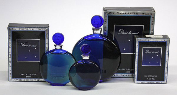 Lalique perfume bottles: Three R. Lalique ''Dans la Nuit'' perfume bottles for Worth Paris in cobalt blue glass