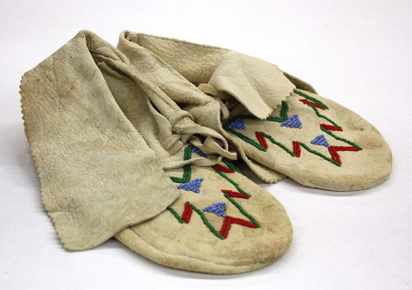 Indian deer skin moccasins: Plains Indian deer skin moccasins accented with beadwork, circa 1940
