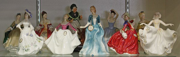 Royal Doulton figurines: (Lot of 10) Royal Doulton figurines including Sheila, Adele, Yvonne, Lisa, Sweet 17, Autumn Breezes, The Last Waltz, Southern Belle, Elegance, and Old Mother Hubbard