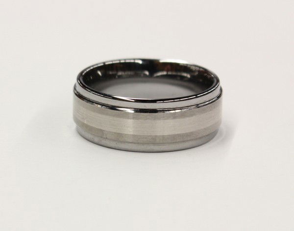 Triton Tungsten Carbide wedding band: Triton Tungsten Carbide wedding band ring; with a platinum center inlay. Total ring weight 17.5 grams. Ring size 10. There is no buyer's premium on this lot.