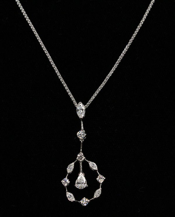 Diamond white gold pendant neckchain: Diamond pendant with neckchain; pendant of 18k white gold, set with (5) marquise cut diamonds weighing in total 0.38 ct, (5) round cut diamonds weighing in total 0.26 ct and (1) pear shaped diamond we