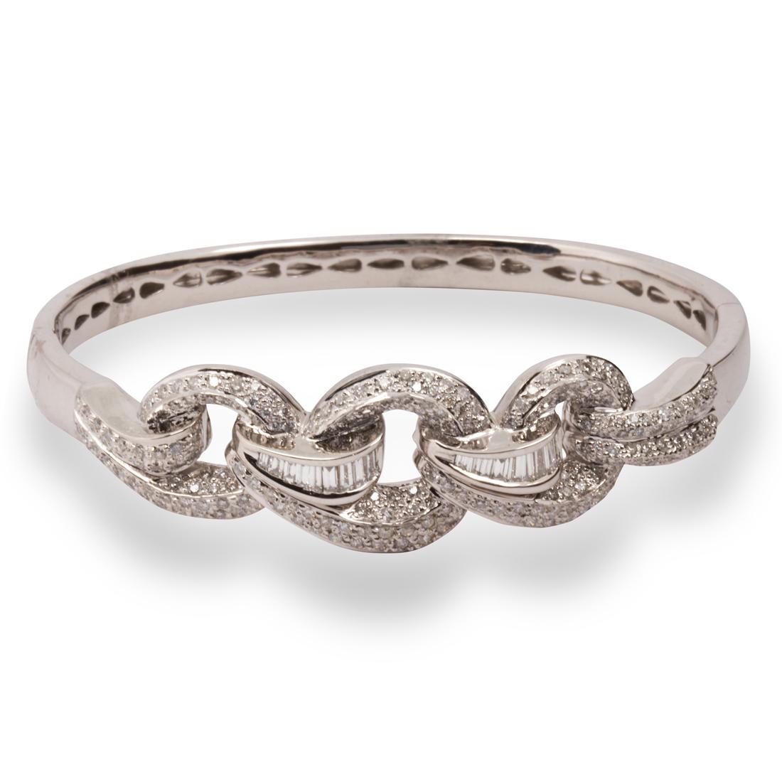 A diamond and eighteen karat white gold bracelet (1 of 2)