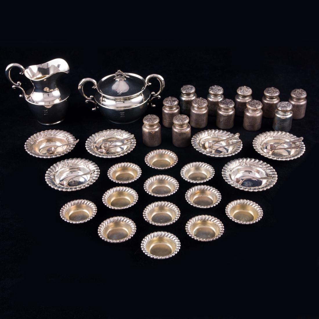 An assembled Shreve & Co sterling table service: salts, shakers, creamer and sugar,etc (1 of 2)