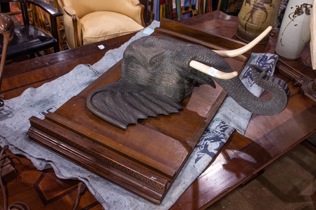 A hand carved wood elephant head, with wall mount, 31"h x 31"w: A hand carved wood elephant head, with wall mount, 31"h x 31"w