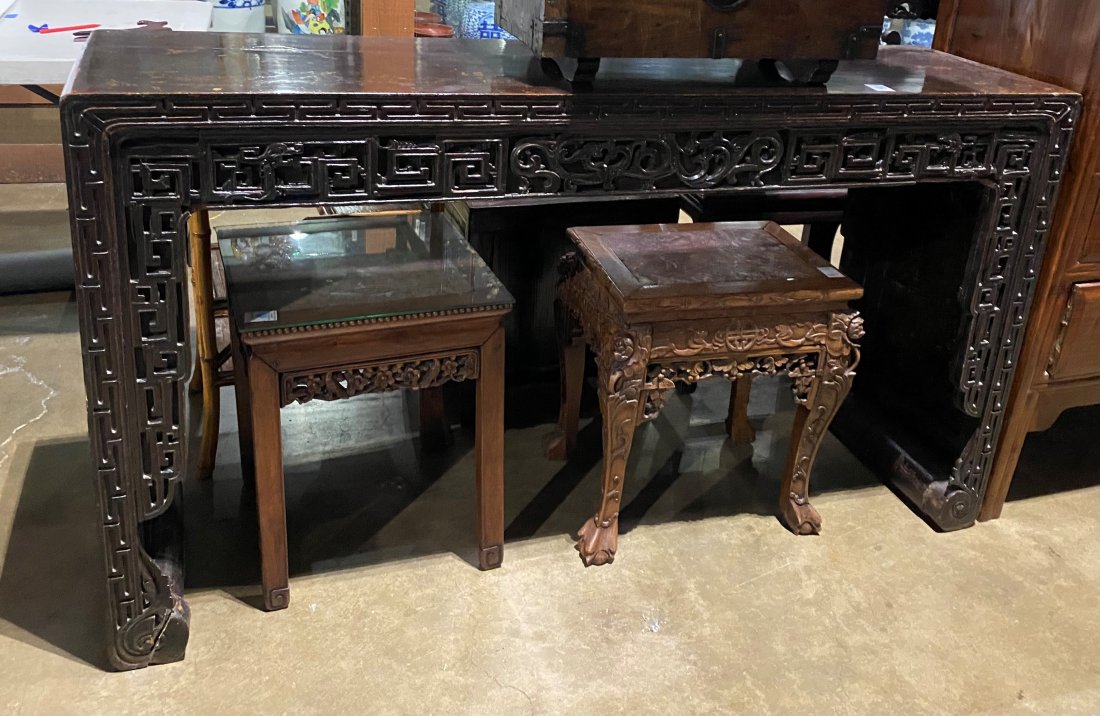 Chinese hardwood altar table: Chinese hardwood altar table, the aprons carved with archaistic chi dragons and fretwork patterns, 34.75"h. x 59.75"w.