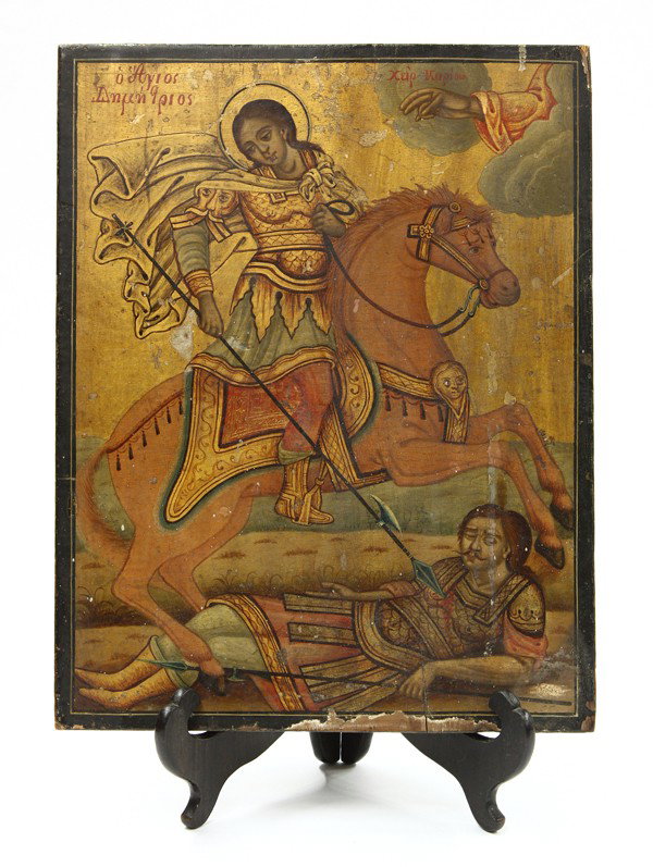 Eastern European icon, St. Demetrius: Eastern European icon, circa 1880, with gesso over a pine panel, depicting St. Demetrius of Thessalonica, wearing golden armour, and plunging his lance into the body of a soldier, 15.25''h x 12''w x 0