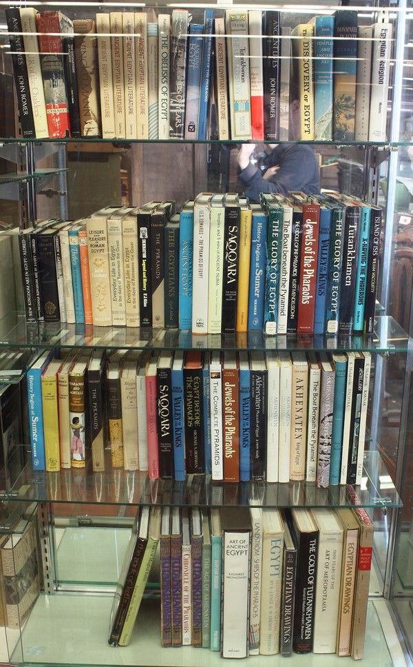 Egyptology book collection: (4 shelves) Egyptology books, including Ancient Egyptian Literature, Miriam Lichteim; History Begins at Sumer, Samuel Noah Kramer; Excavations at UR, Sir Leonard Woolley; The Buried Pyramid, M. Zakari