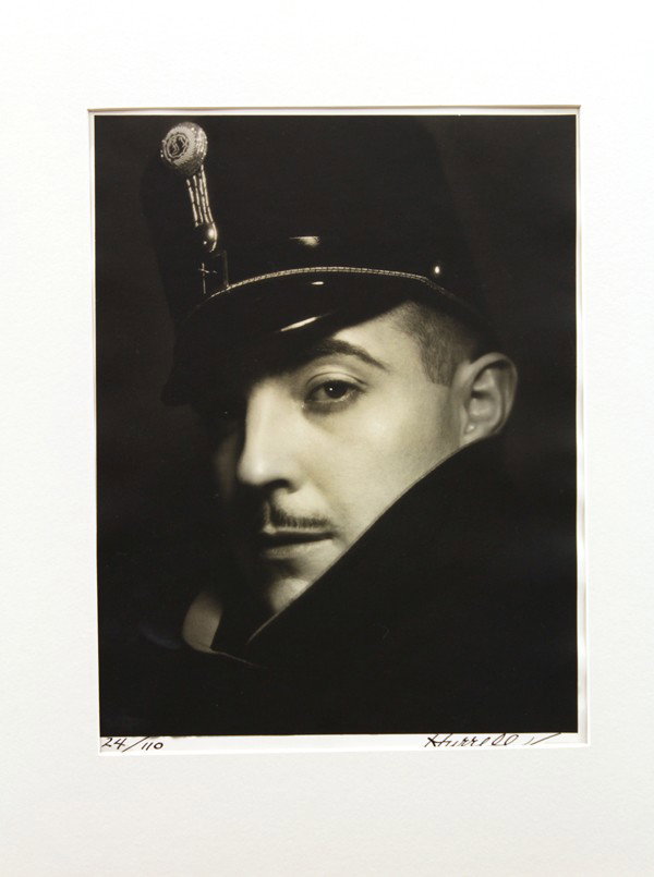 Photograph, George Hurrell, Roman Navarro: Unframed (matted) gelatin silver print, ''Roman Navarro,'' 1930, by George Hurrell (American, 1904-1992), signed ''Hurrell'' lower right, numbered edition of 110 lower left, studio notes verso, paper: