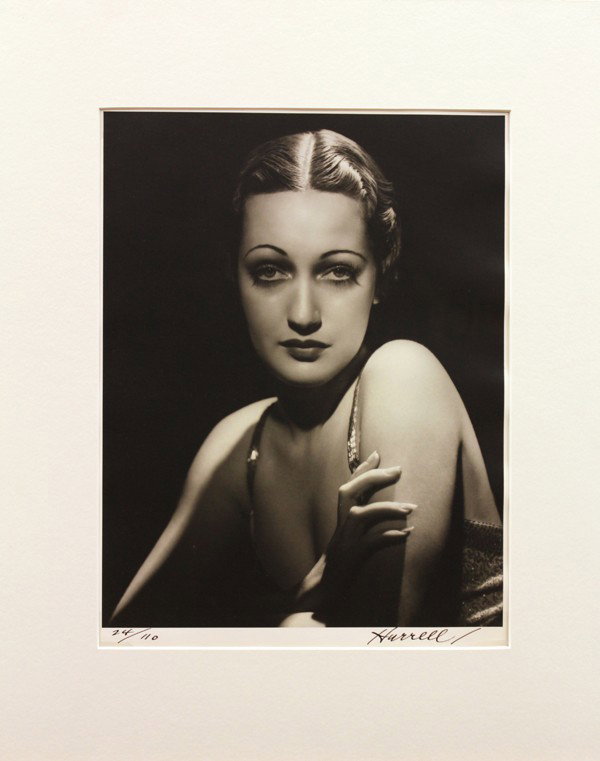 Photograph, George Hurrell, Dorothy Lamour: Unframed (matted) gelatin silver print, ''Dorothy Lamour,'' 1936, by George Hurrell (American, 1904-1992), signed ''Hurrell'' lower right, numbered edition of 110 lower left, studio notes verso, paper