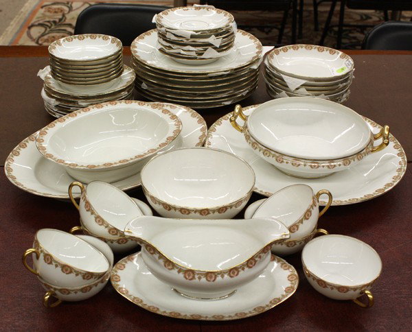 Limoges table service: (lot of 53) Limoges Bawo and Dotter Elite Works partial table service for eight, including (8) dinner plates 9.75''w, (8) bread and butter plates, (8) soup bowls, (8) nut dishes, (7) cups with (8) sau