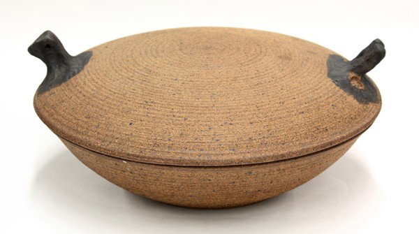 Vivika and Otto Heino studio pottery: Vivika and Otto Heino covered studio vessel, 1965, the wheel thrown vessel having a ribbed matte exterior, the lid with bird form handles having a black glaze, the interior having a high glaze, incise