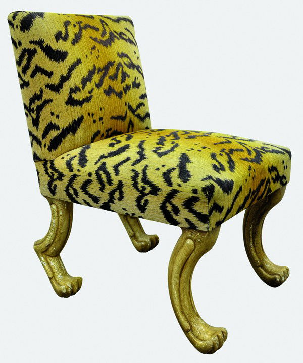 John Dickinson chairs: (Lot of 4) ''Etruscan'' chairs attributed to John Dickinson, San Francisco, covered in a tiger print fabric and rising on exotic naturalistic legs, 36''h