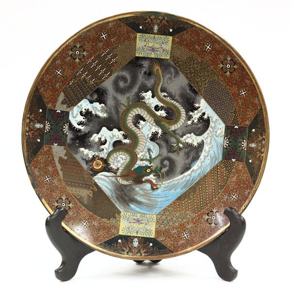 Japanese Cloisonne Dragon Plate, Meiji: Japanese cloisonne enamel plate, Meiji period, 19th century, the interior well decorated in bright enamels with four rectangular foliate plaques framing a large center panel of a dragon and sacred jew