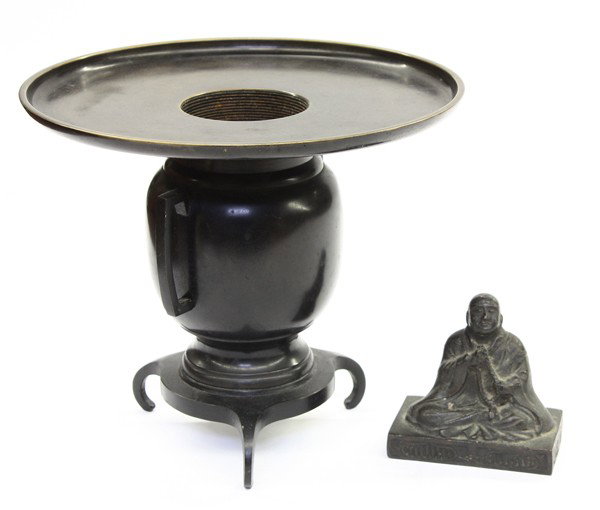 Japanese Bronze Usubata/Bronze Buddhist Figure: (Lot of 2) Japanese patinated two-section bronze usubata, with the characteristic wide dished rim fitted into an ovoid body with squared handles and supported on a tripod base, 8''h; together with a s