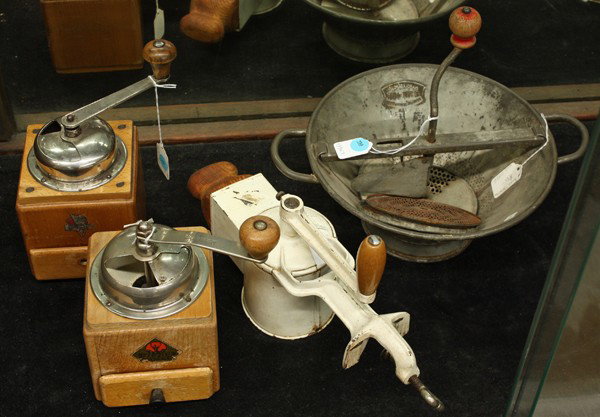 Grinder group: (lot of 4) Group of associated grinders including coffee grinders, meat grinder, and a passe-vite, largest 9''h