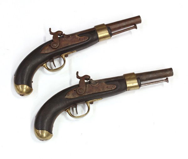 Flint lock pistols: (lot of 2) Pair of flint lock pistols having ebony bodies and iron barrels with brass hardware, one with proof mark B, barrel 8'', overall 14''
