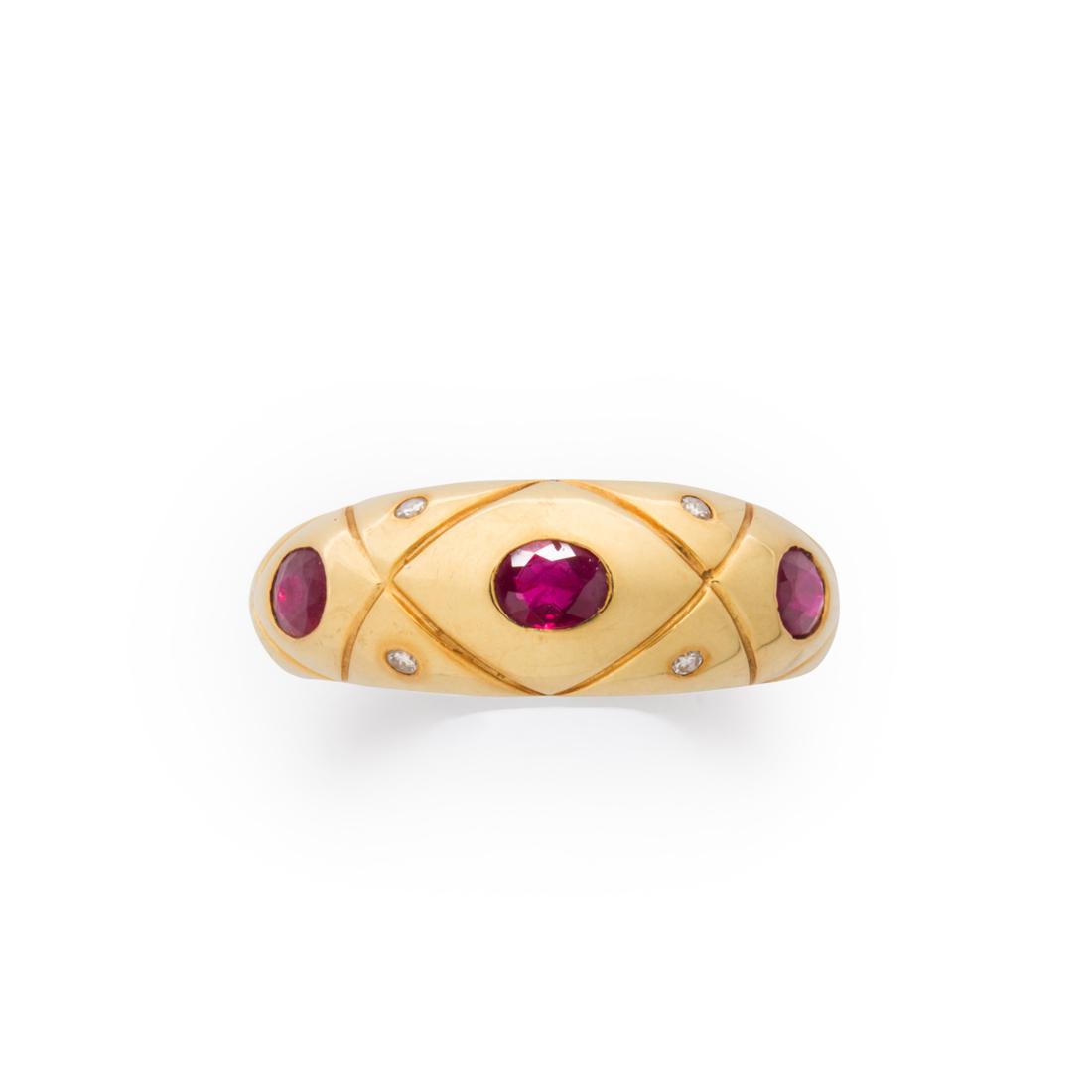 A diamond, ruby and eighteen karat gold ring (1 of 2)