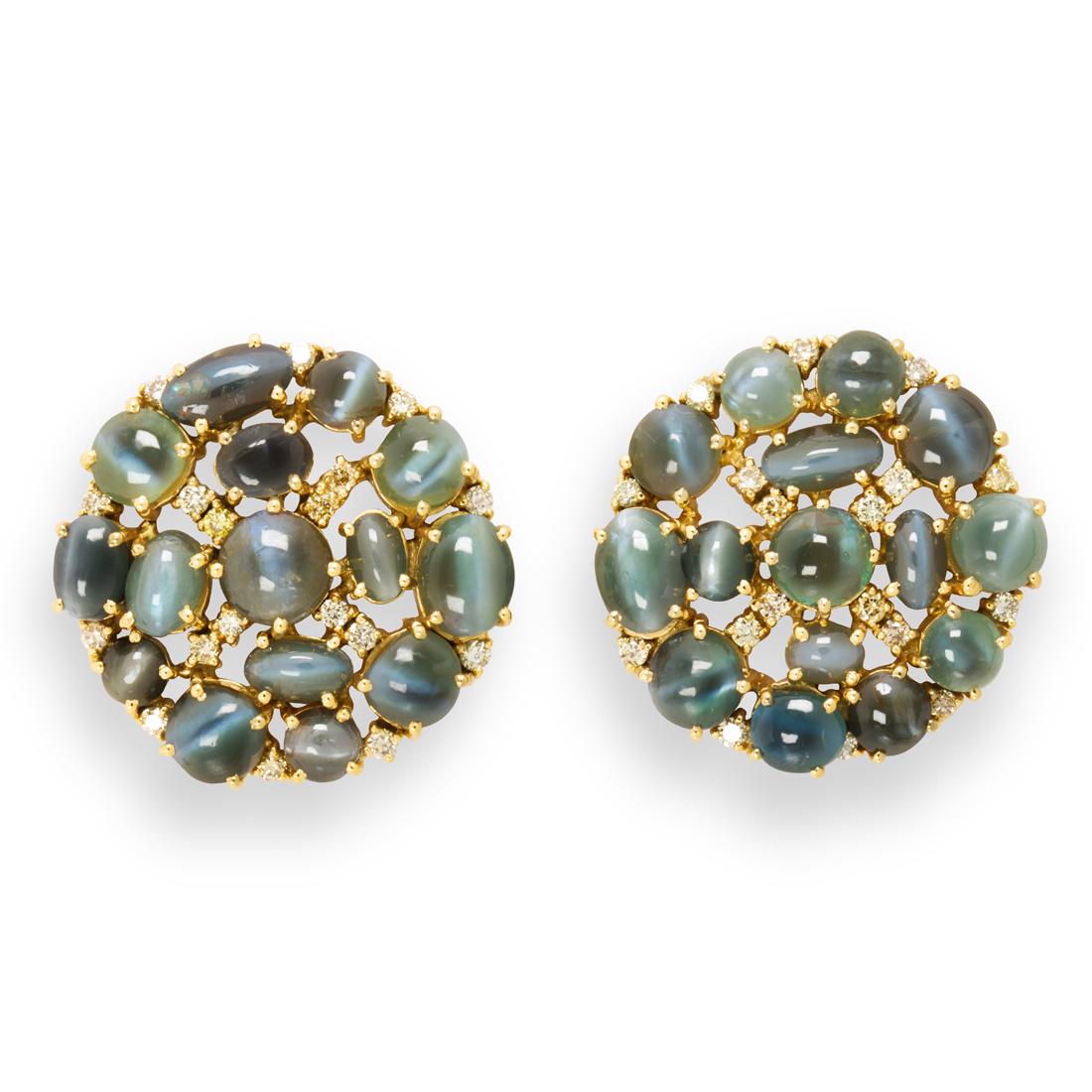 A pair of cat's eye chrysoberyl, diamond and eighteen karat gold earrings (1 of 1)
