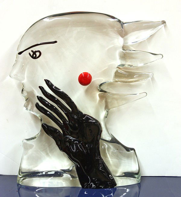 James Coignard glass sculpture: Glass sculpture, Profile, by James Coignard (French, 1925-2008), depicting a female executed in clear glass with her hand raised and wearing crimson glass earrings, signed lower verso, 17.5''H X 16''W