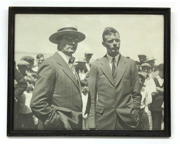 Charles Lindbergh signed photograph: Photograph, Charles Lindbergh, autographed gelatin silver print, at the Cleveland Municipal Airport, August 1st, 1927, photographed by James Meli, frame: 8''h x 10''w, sight: 7.25''h x 9.25''w, 8''h x