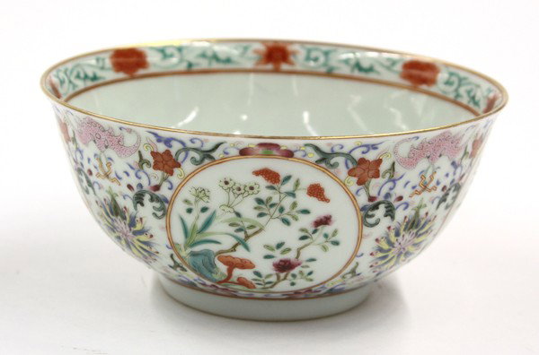 Chinese Enameled Porcelain Bowl: Chinese polychrome enameled porcelain bowl, of inverted bell form with the exterior delicately painted in bright enamels with four floral roundels framed by stylized lotus below pink bats on a dense g