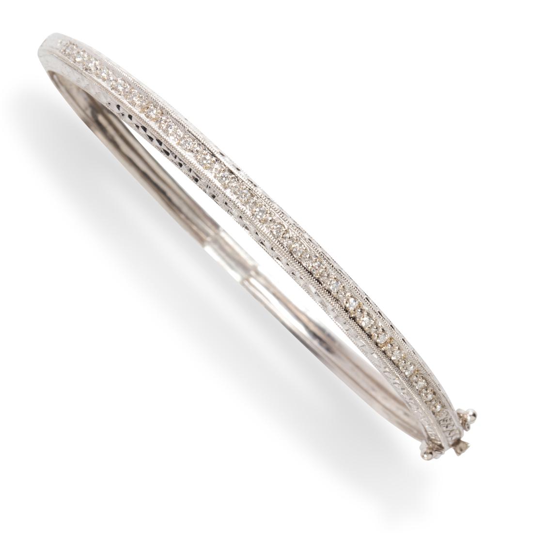 A diamond and eighteen karat white gold bracelet (1 of 2)